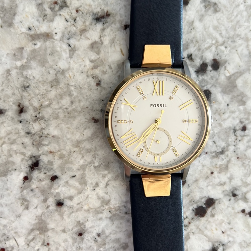 Women’s Fossil watch.